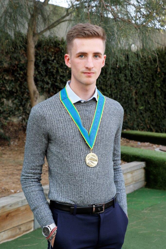 Aaron Quarrell wearing his Youth Mayor medal